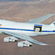 Illustration for article titled NASA's Stubby 747 Has A Big Telescope In The Back That Can See Pluto